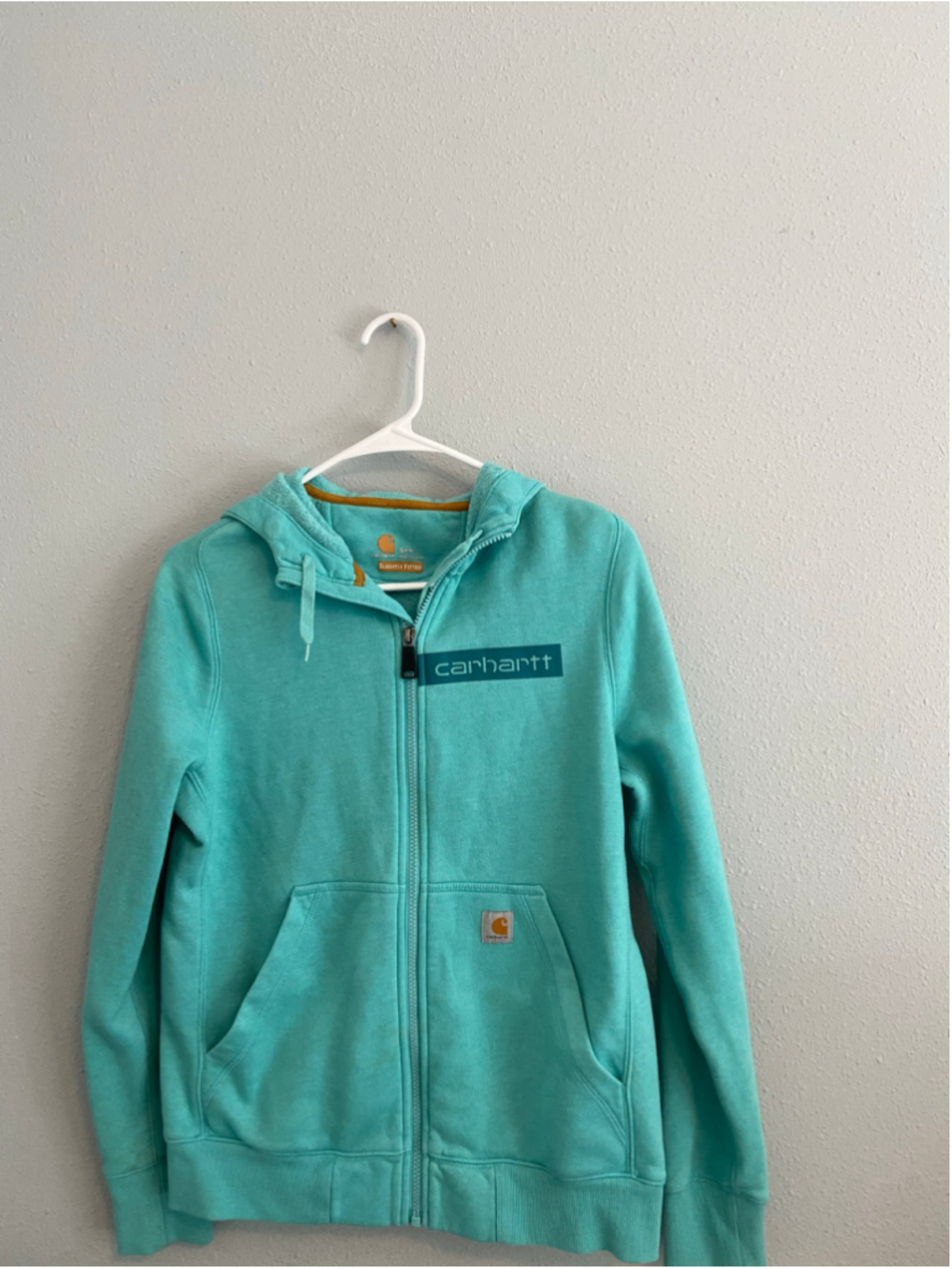 Teal warm hoodie by Carhartt, size small ( 4 to 6)